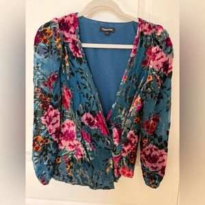 Yumi Kim floral wrap shirt with sheer sleeves.